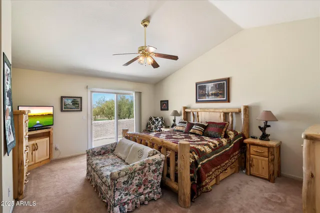 a spacious bathroom with a granite countertop sink mirror and shower