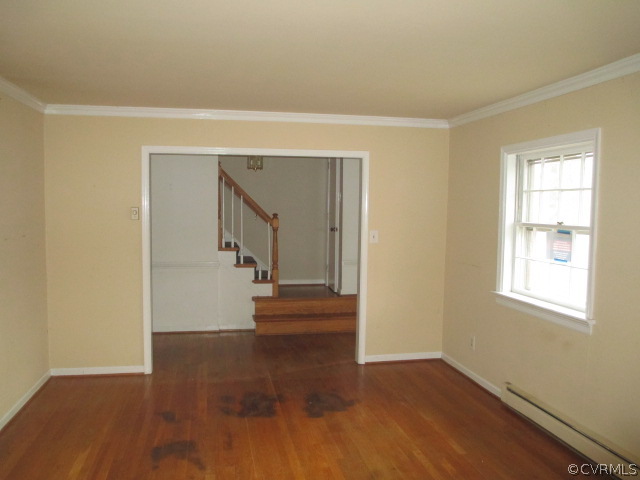 1201 Black Heath Road Midlothian, VA 23113 - Photo 6 of 17 a view of an empty room with wooden floor and a window