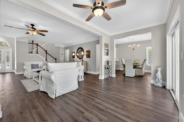 a kitchen with stainless steel appliances a refrigerator sink and microwave