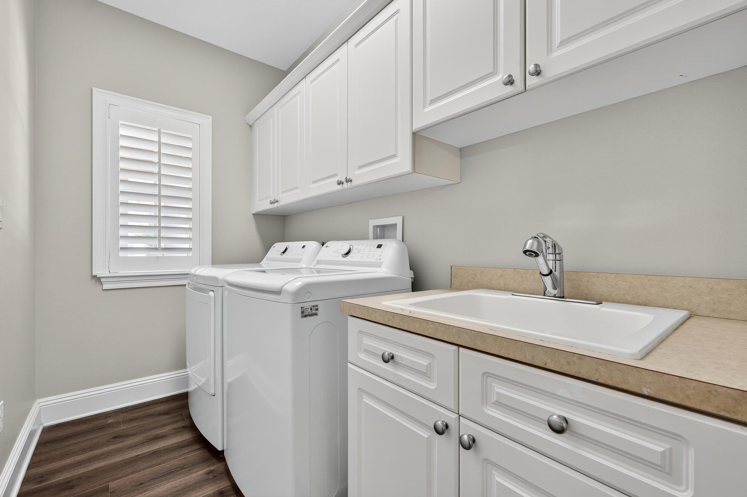 298 Ketch Court Destin, FL 32541 - Photo 28 of 79 a utility room with dryer and washer