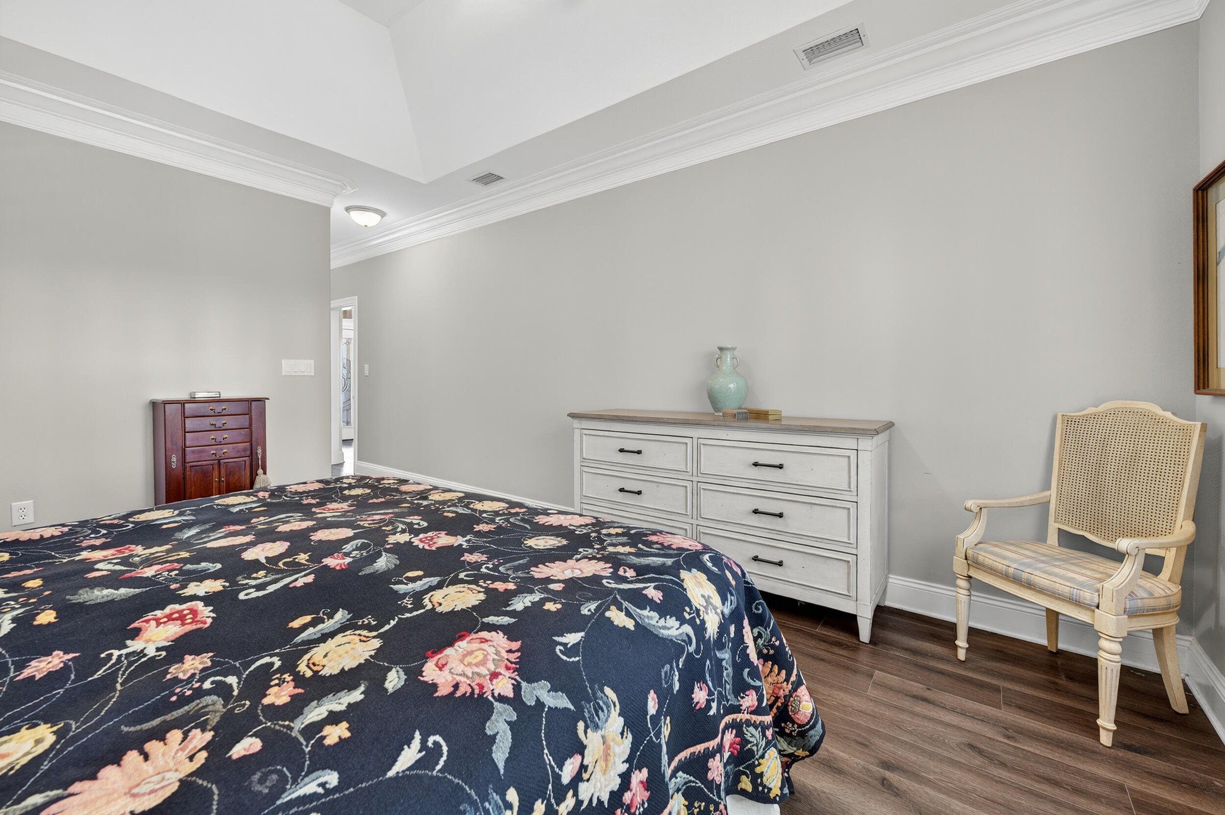 298 Ketch Court Destin, FL 32541 - Photo 33 of 79 a bedroom with a bed and chair