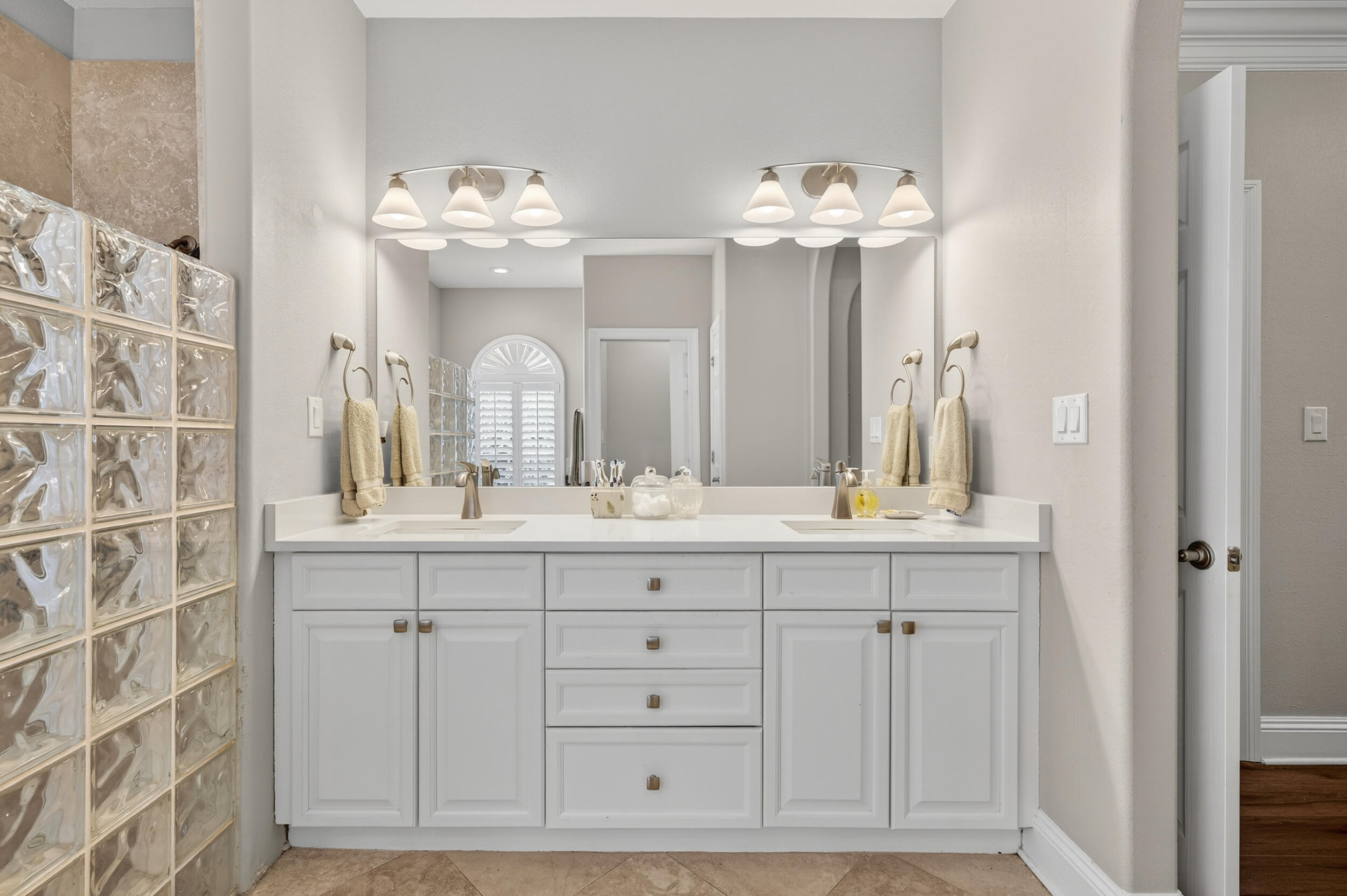 298 Ketch Court Destin, FL 32541 - Photo 37 of 79 a bathroom with a sink vanity and a mirror