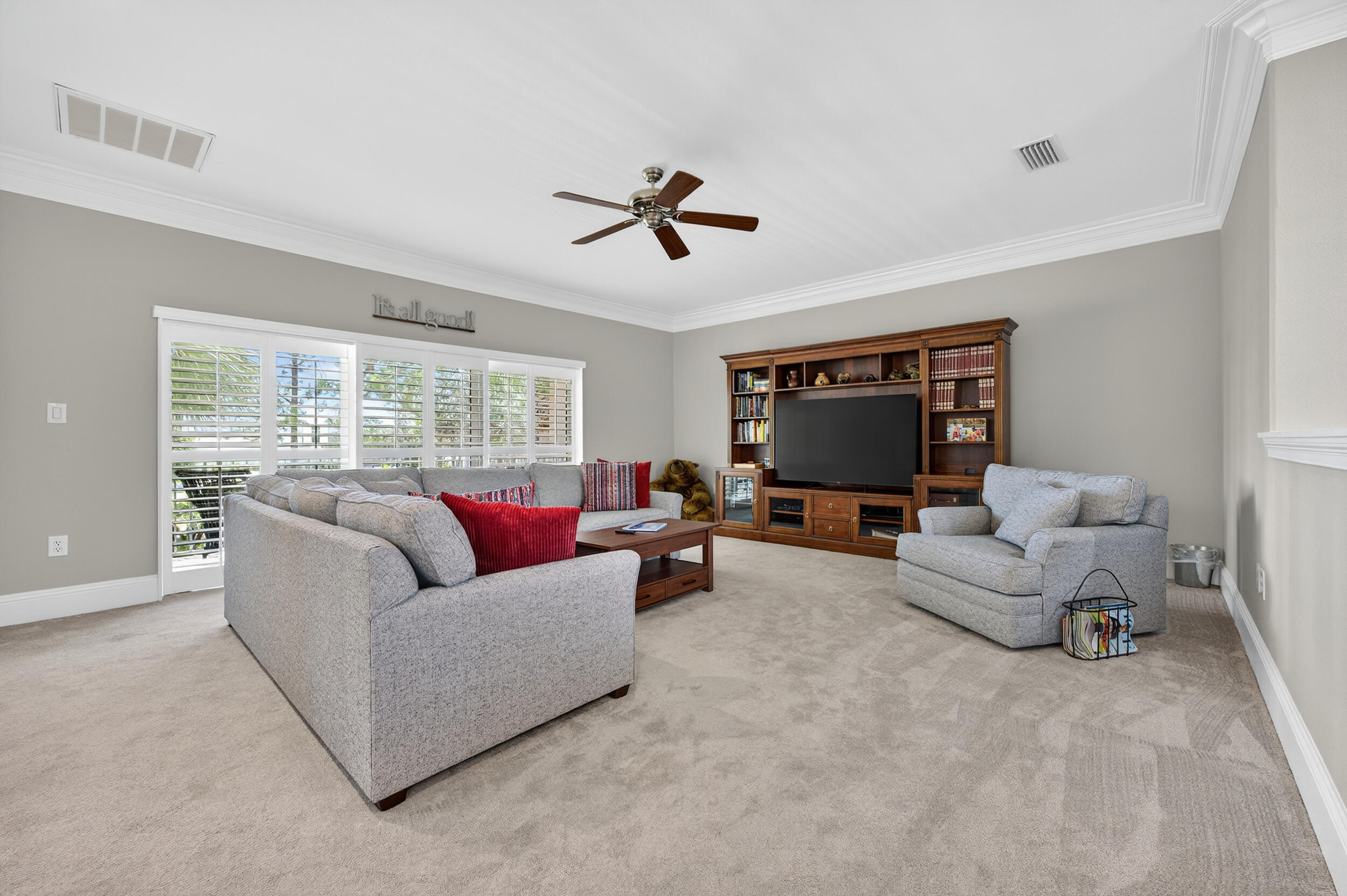 298 Ketch Court Destin, FL 32541 - Photo 41 of 79 a living room with furniture and a flat screen tv