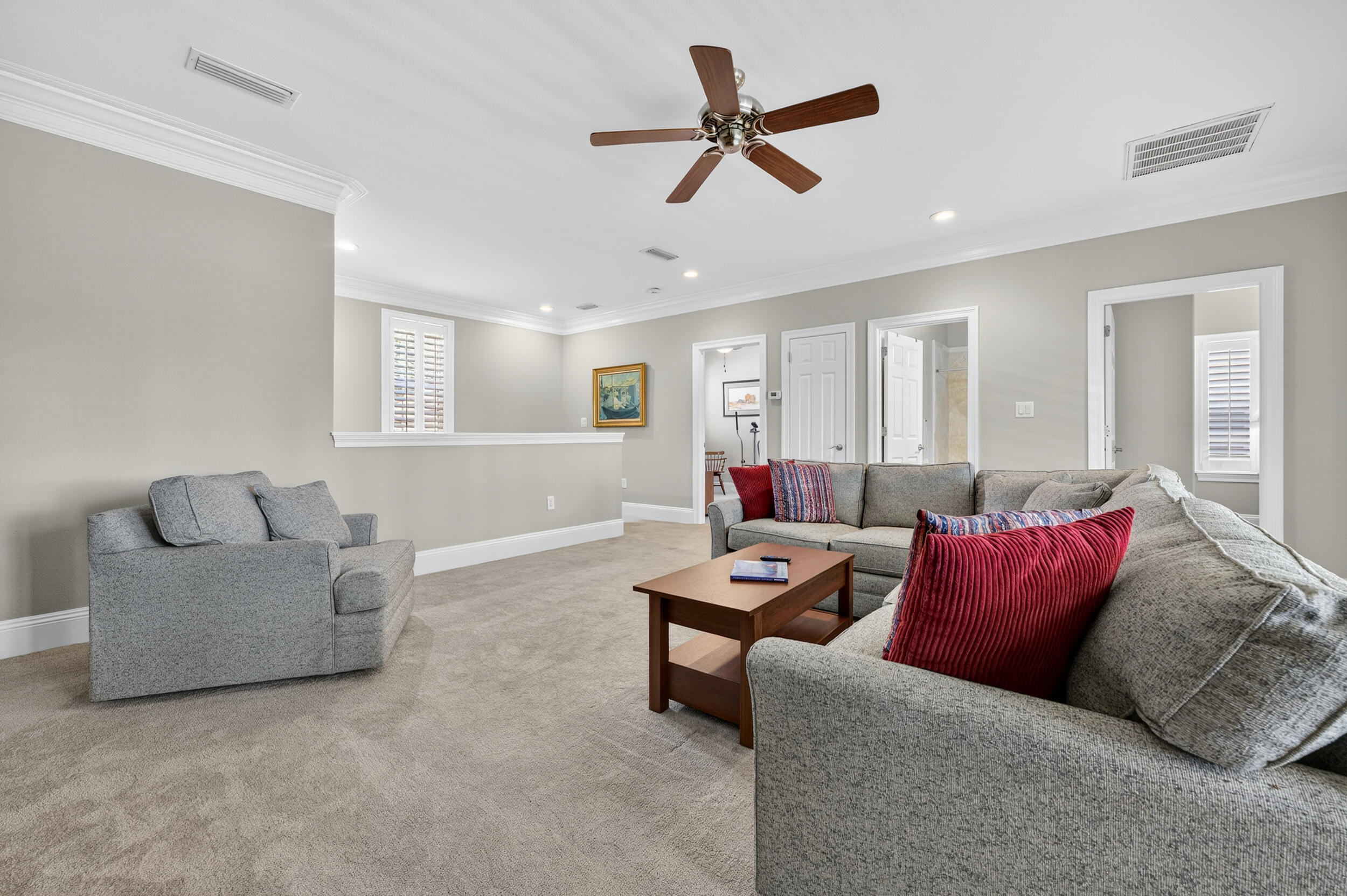 298 Ketch Court Destin, FL 32541 - Photo 43 of 79 a living room with furniture and a ceiling fan