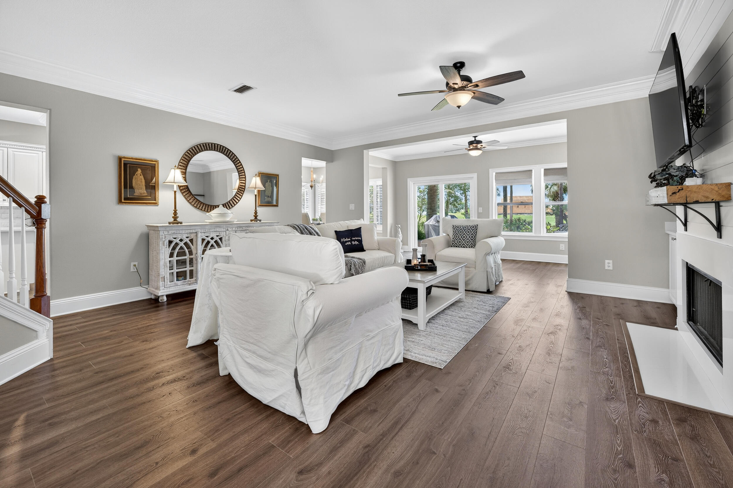 298 Ketch Court Destin, FL 32541 - Photo 6 of 79 a living room with furniture and a flat screen tv