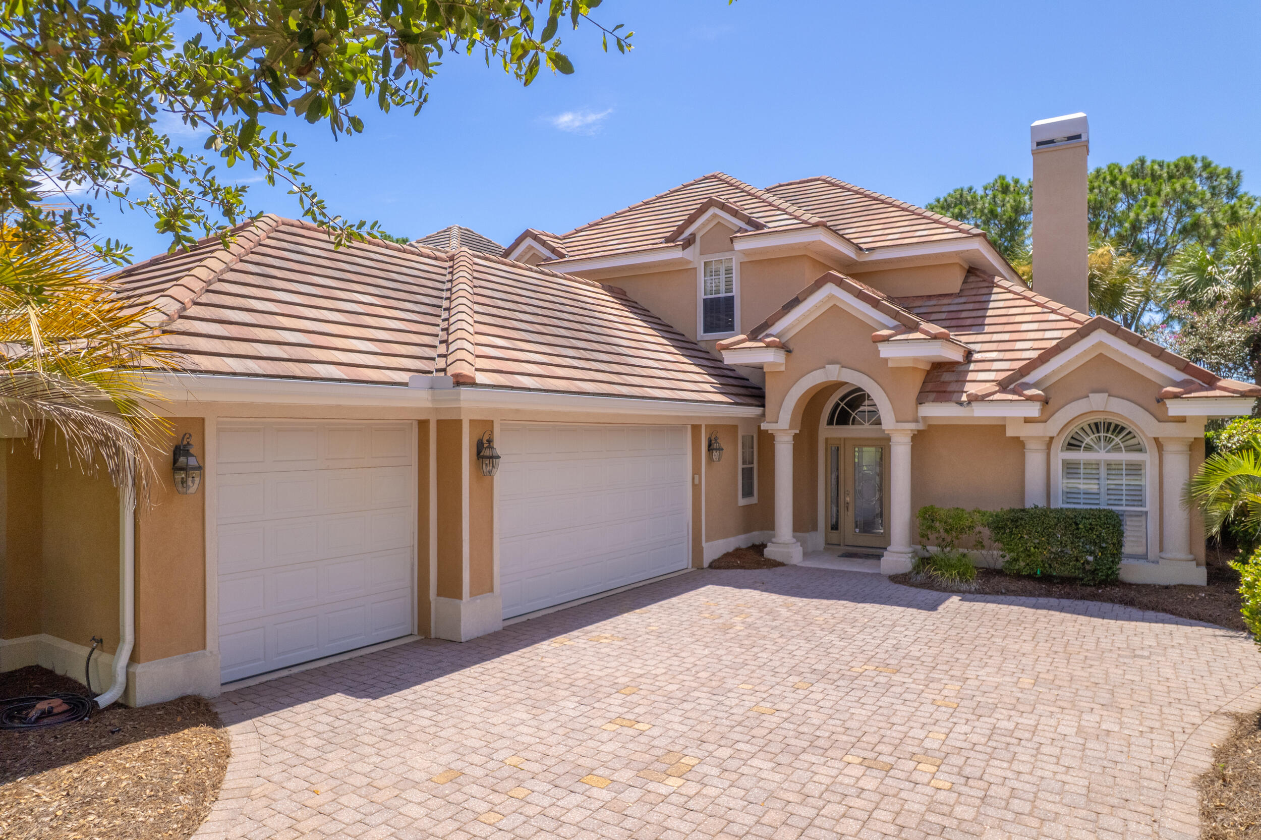 298 Ketch Court Destin, FL 32541 - Photo 79 of 79 a front view of a house with a yard and garage