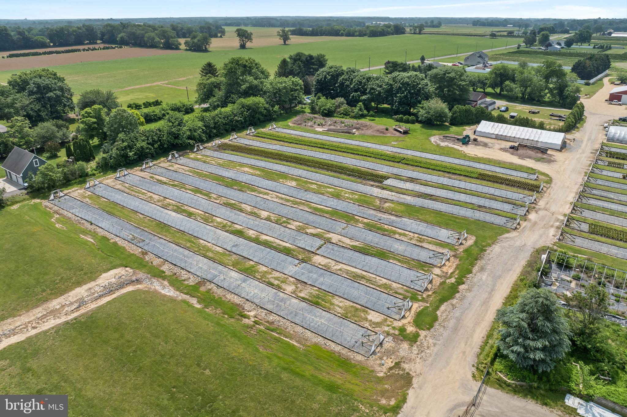 360 Harmony Road Bridgeton, NJ 08302 - Photo 21 of 23 a view of a swimming pool with a lake view