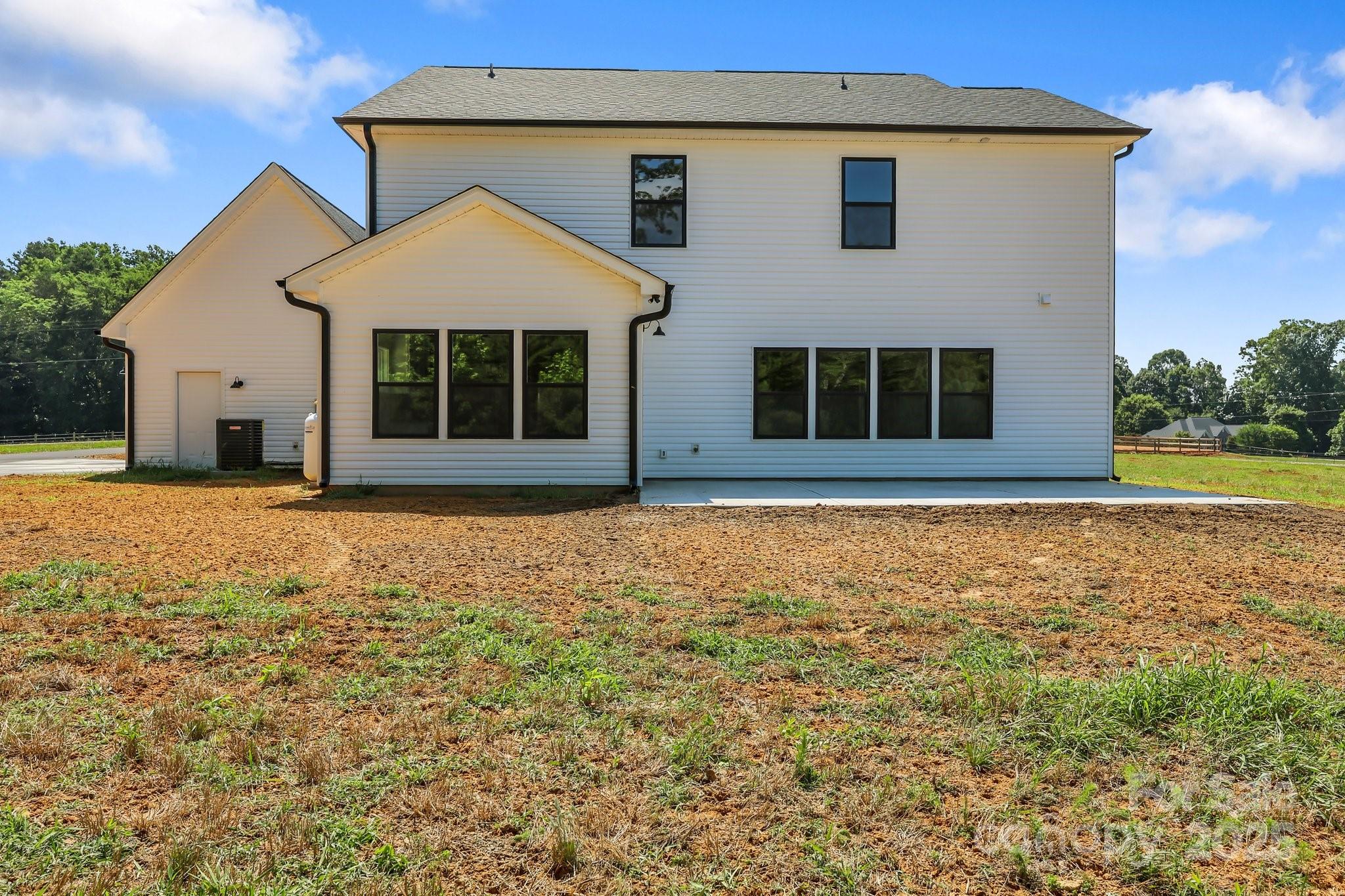 4040 Daugherty Road China Grove, NC 28023 - Photo 13 of 45 front view of a house with a yard