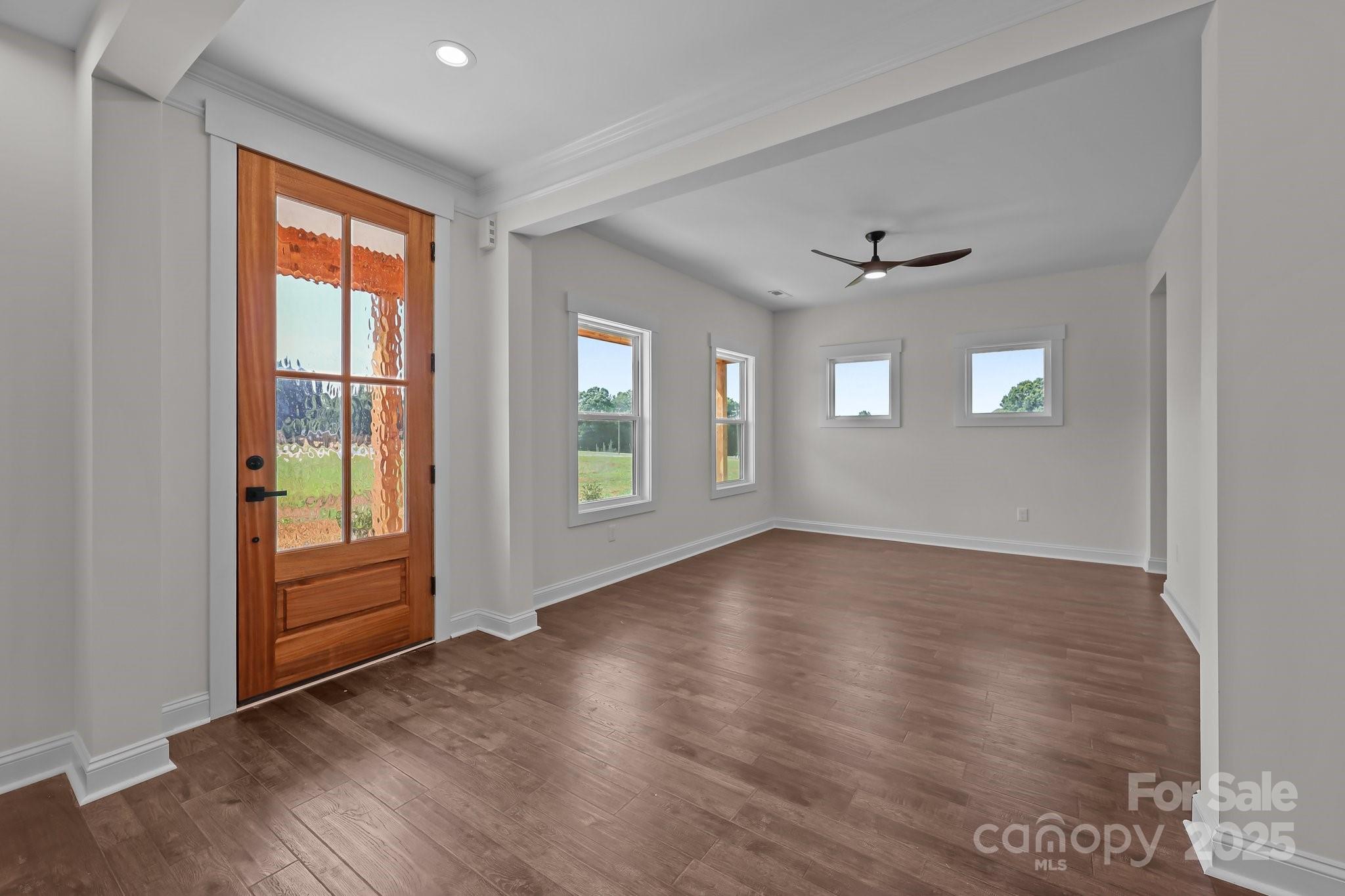 4040 Daugherty Road China Grove, NC 28023 - Photo 15 of 45 a view of an empty room with a window and wooden floor