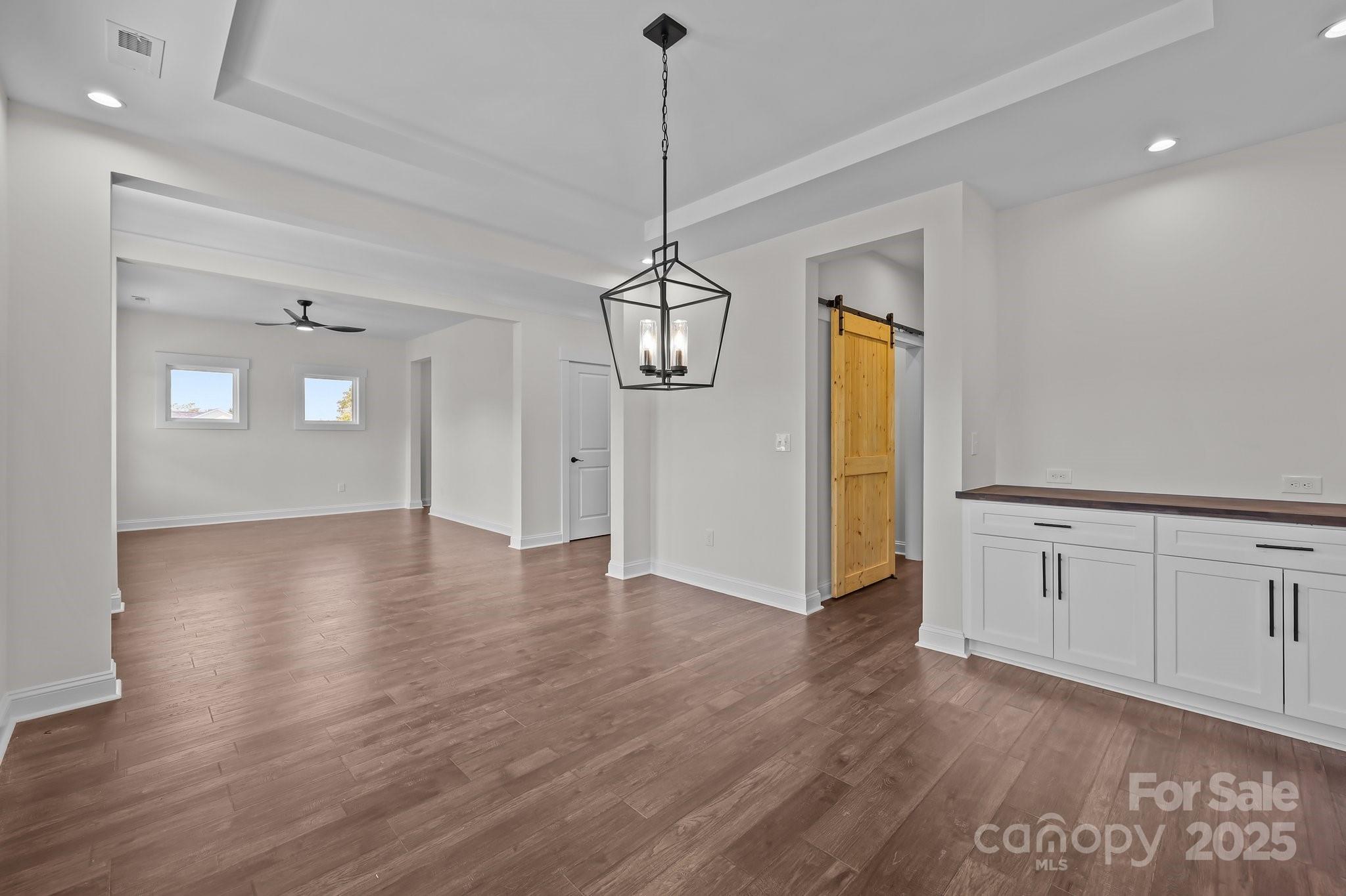 4040 Daugherty Road China Grove, NC 28023 - Photo 17 of 45 a view of an empty room with window and wooden floor