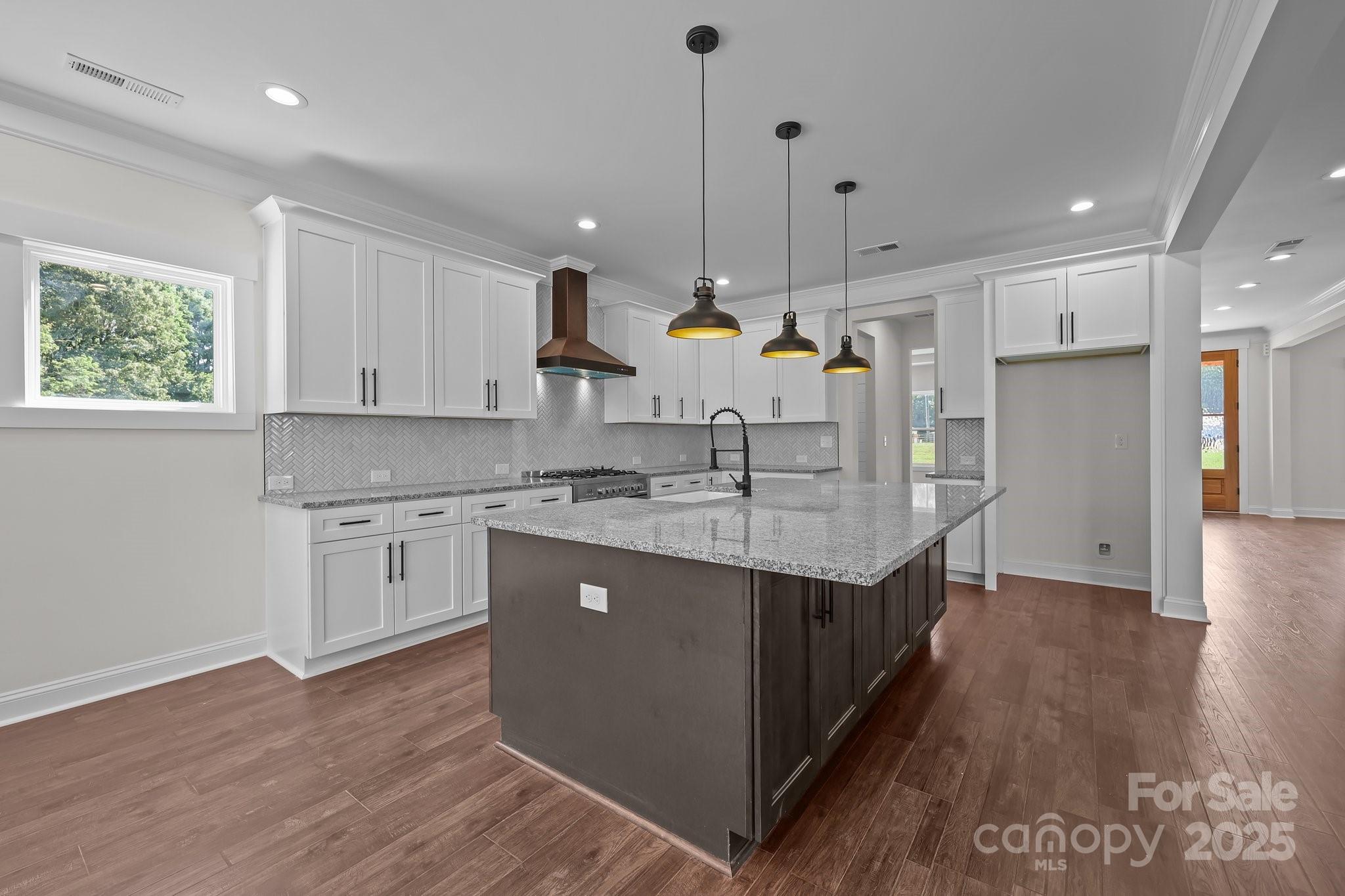 4040 Daugherty Road China Grove, NC 28023 - Photo 23 of 45 a kitchen with a sink a counter top space stainless steel appliances and a window