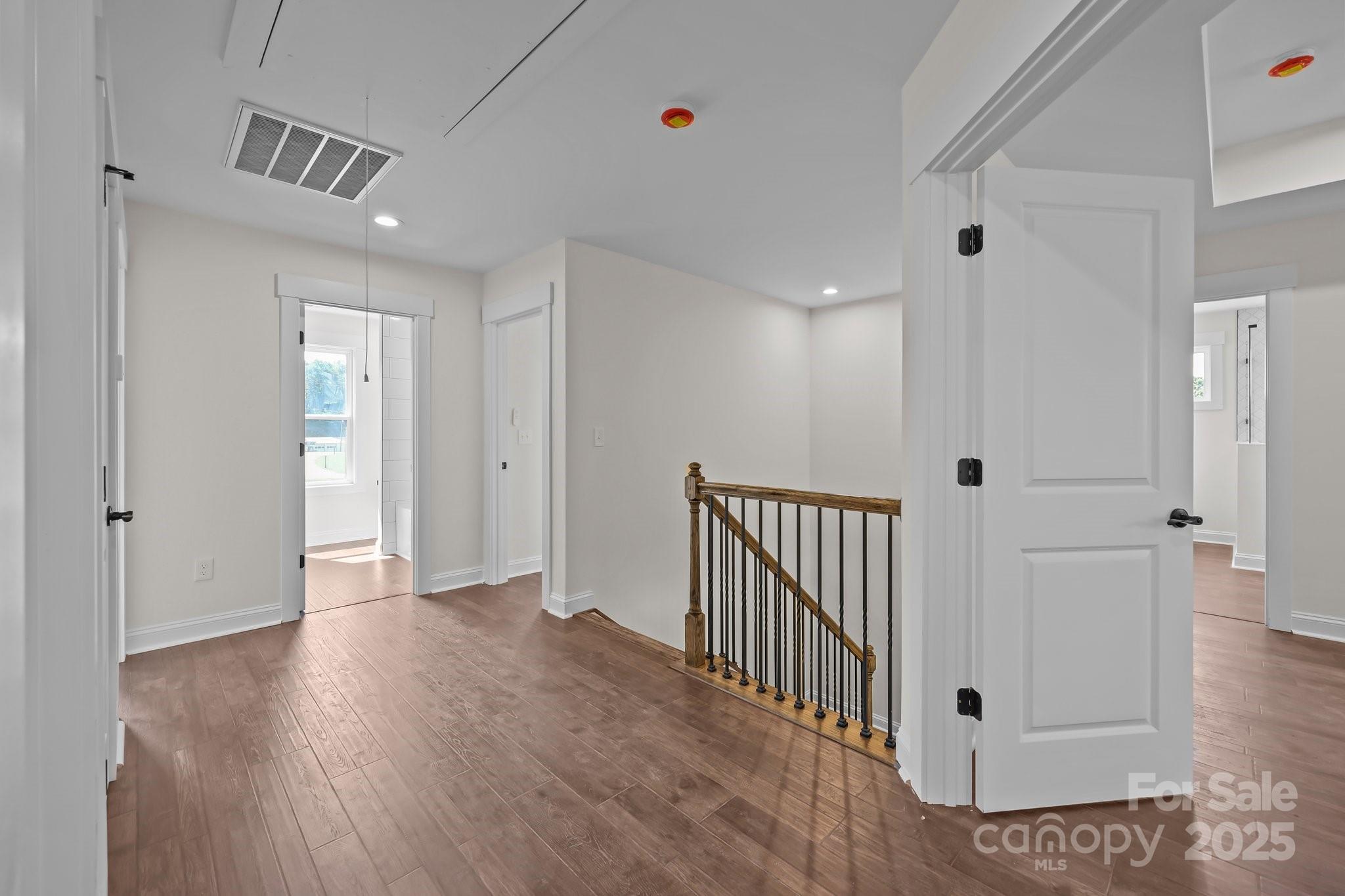 4040 Daugherty Road China Grove, NC 28023 - Photo 33 of 45 a view of a hallway with wooden floor and entryway