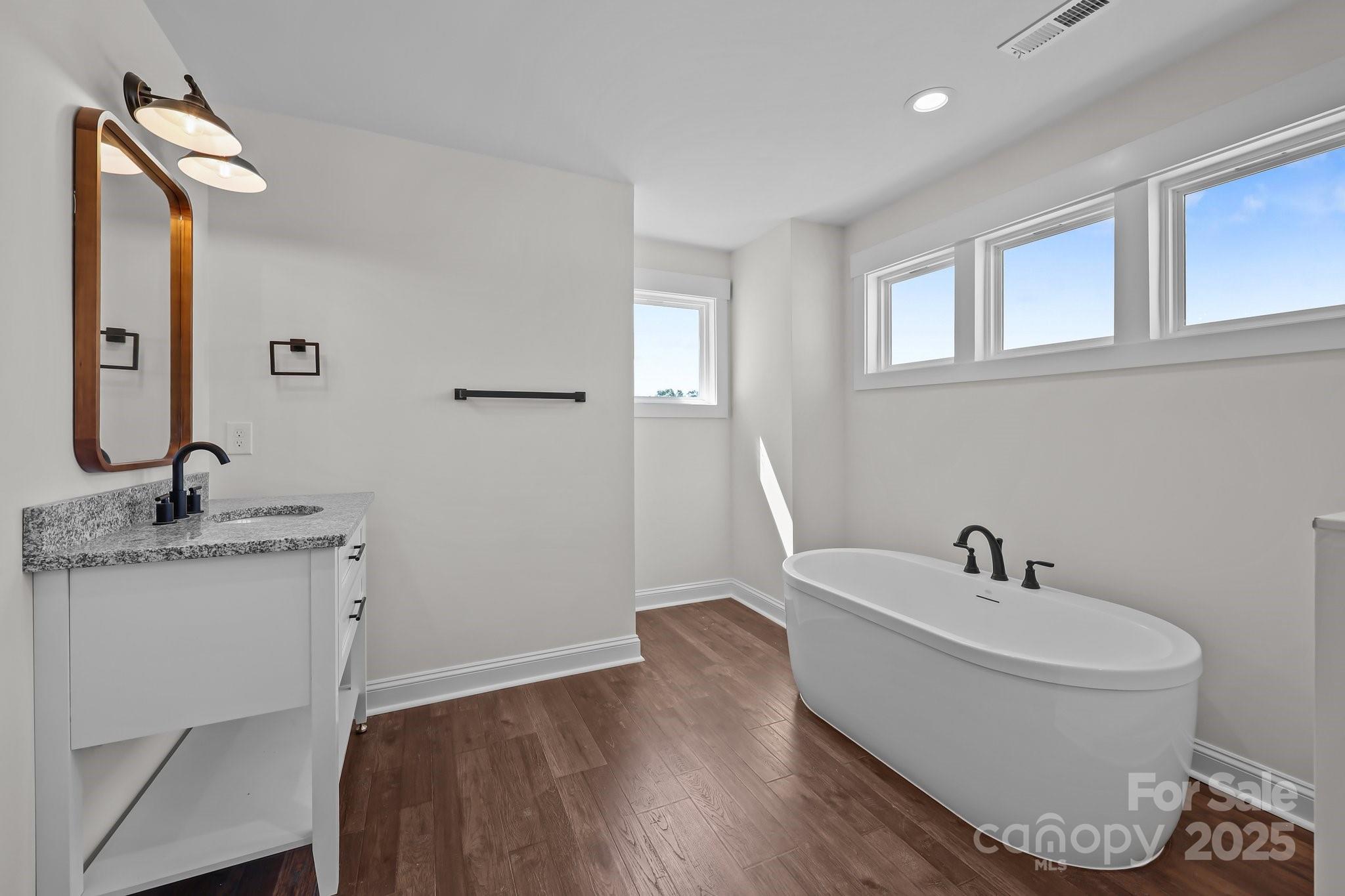 4040 Daugherty Road China Grove, NC 28023 - Photo 36 of 45 a bathroom with a sink and a mirror