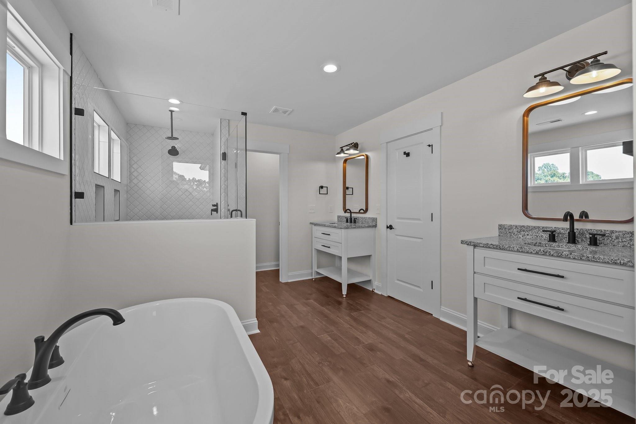 4040 Daugherty Road China Grove, NC 28023 - Photo 37 of 45 a bathroom with a sink a toilet and a mirror