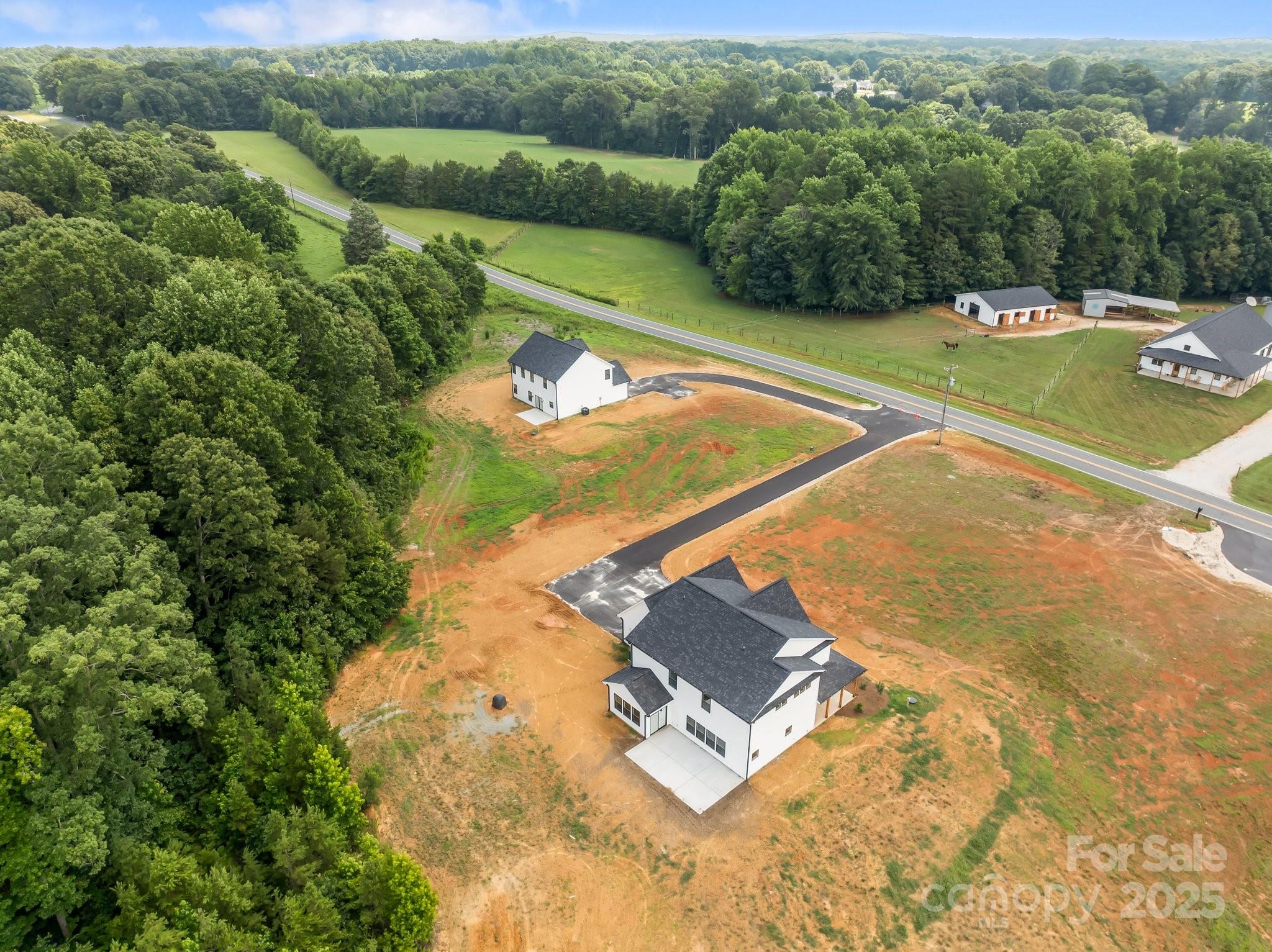 4040 Daugherty Road China Grove, NC 28023 - Photo 6 of 45 a view of a swimming pool with a yard