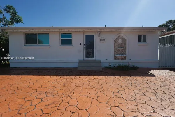 a front view of a house with shower