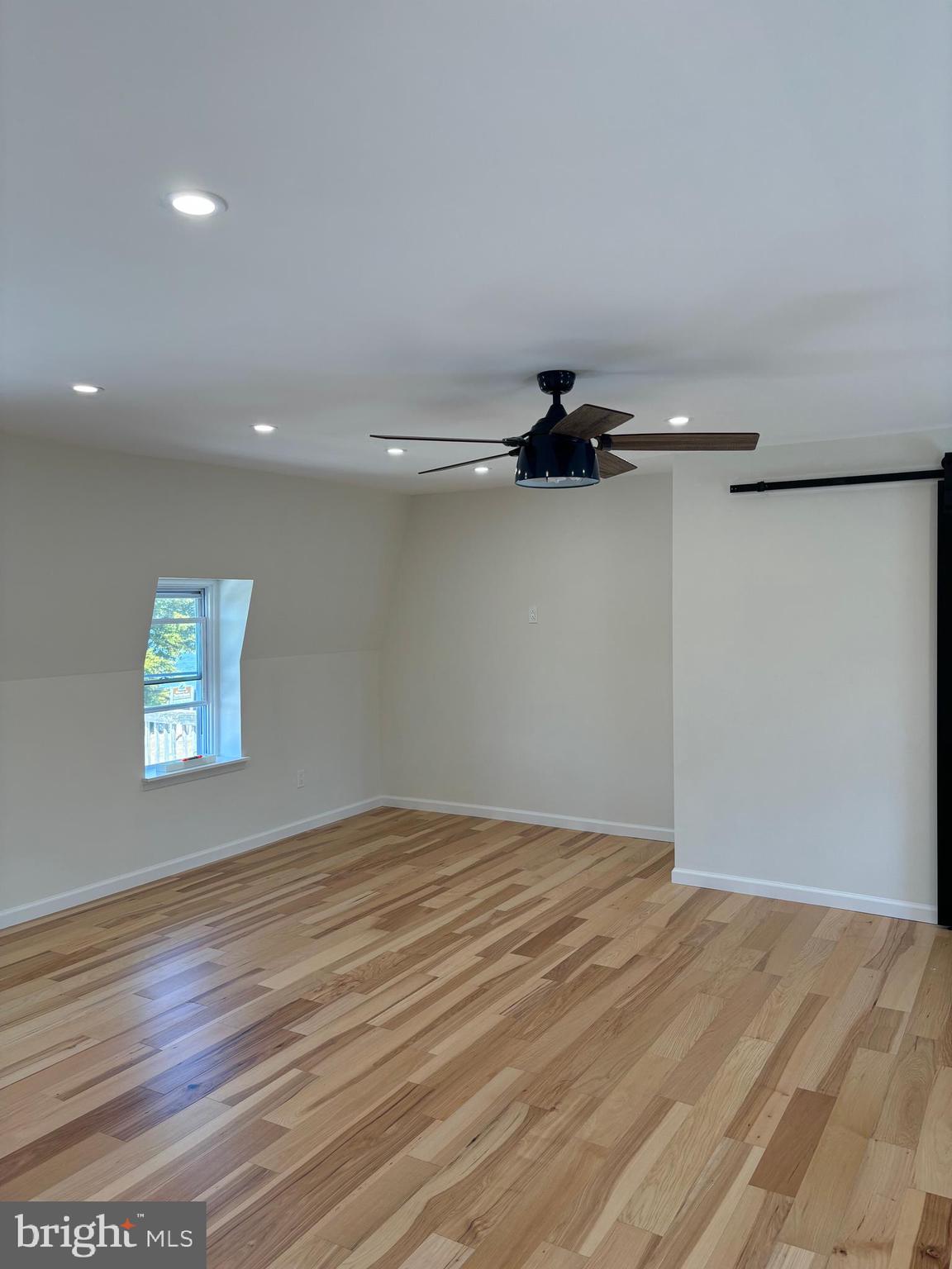 7501 Church Hill Road, Unit 5 Chestertown, MD 21620 - Photo 8 of 17 wooden floor in a room with a window