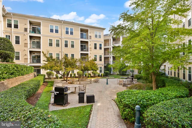 a view of swimming pool with outdoor seating