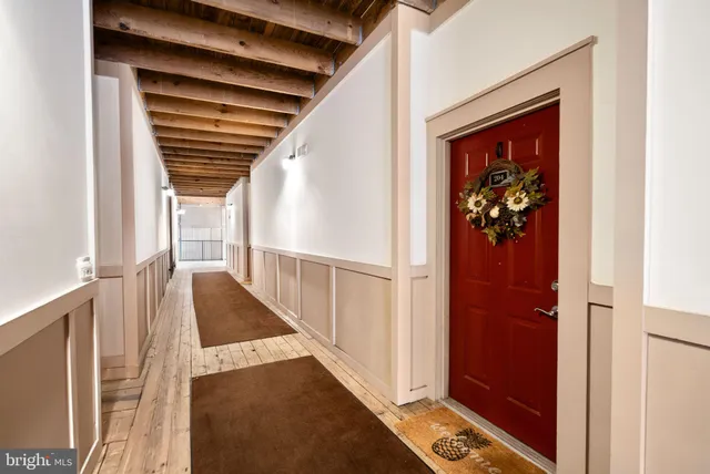a kitchen with stainless steel appliances a stove sink microwave and cabinets