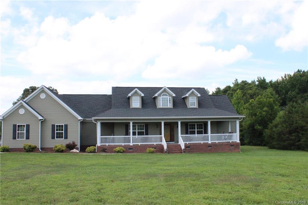 526 Maynard Grayson Road Clover, SC 29710 - Photo 1 of 19 a front view of a house with a garden