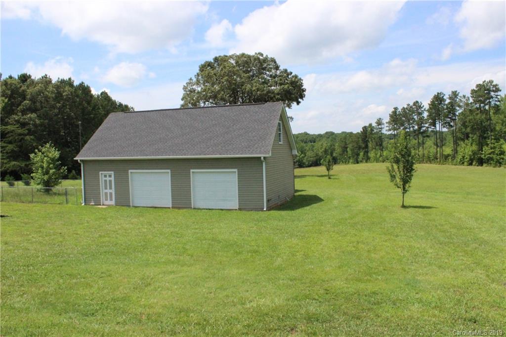 526 Maynard Grayson Road Clover, SC 29710 - Photo 16 of 19 a house with a yard