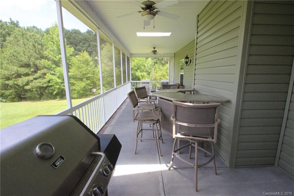 526 Maynard Grayson Road Clover, SC 29710 - Photo 4 of 19 a view of a patio with a table chairs and backyard