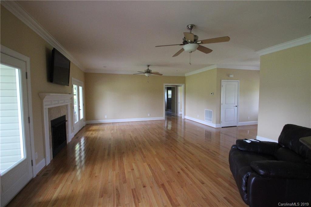 526 Maynard Grayson Road Clover, SC 29710 - Photo 10 of 19 a living room with furniture and a fireplace