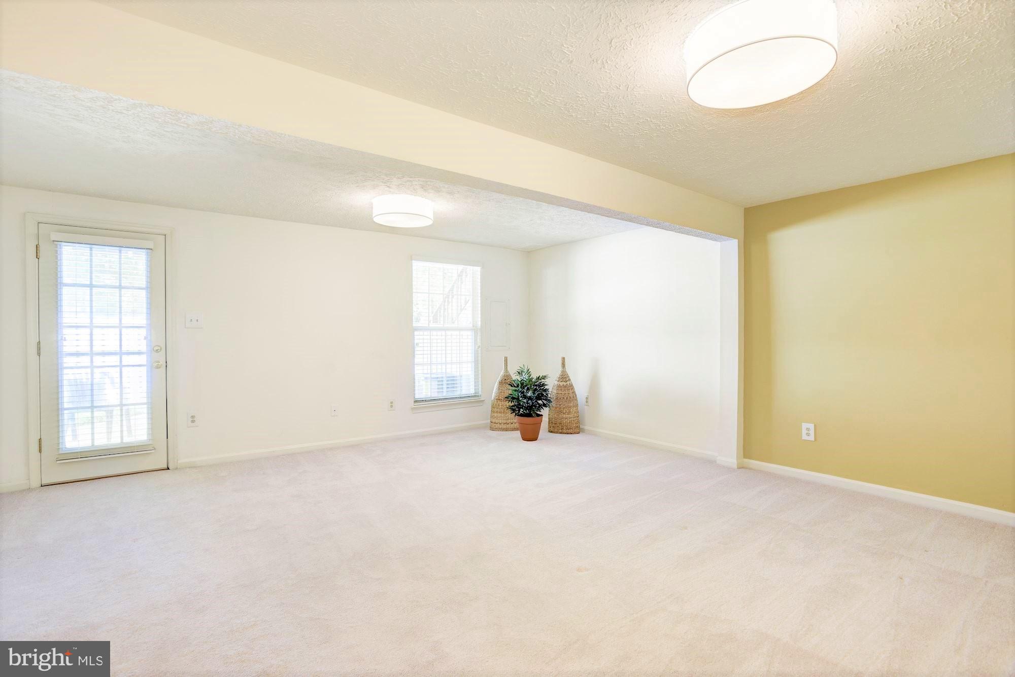 1501 Autumn Ridge Circle Reston, VA 20194 - Photo 16 of 22 HUGE Recreation Rm walks out to lower lvl deck