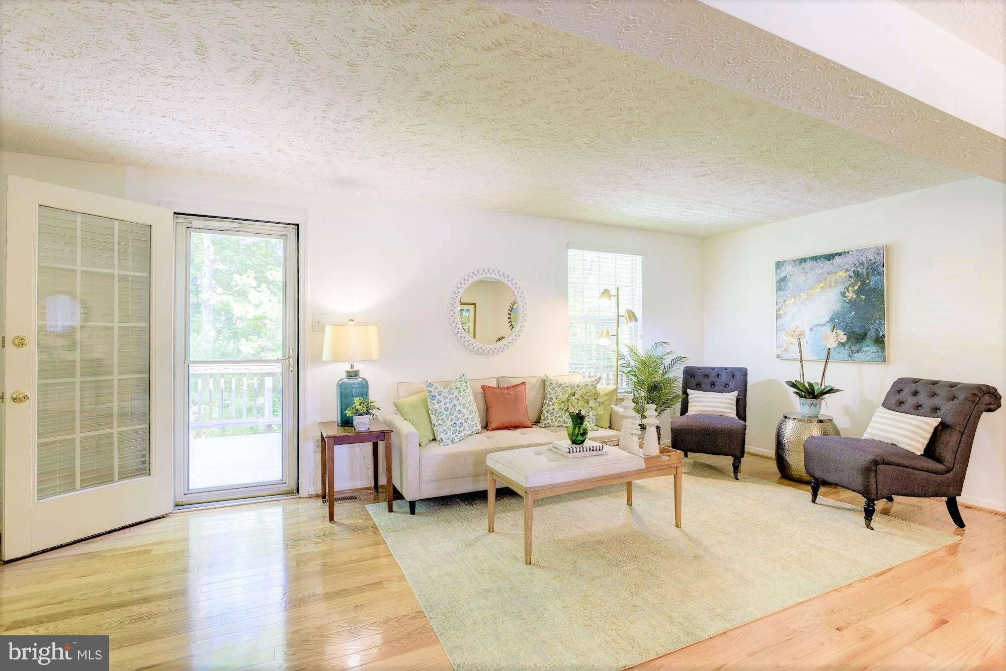 1501 Autumn Ridge Circle Reston, VA 20194 - Photo 3 of 22 Inviting Living Room opens to deck viewing trees