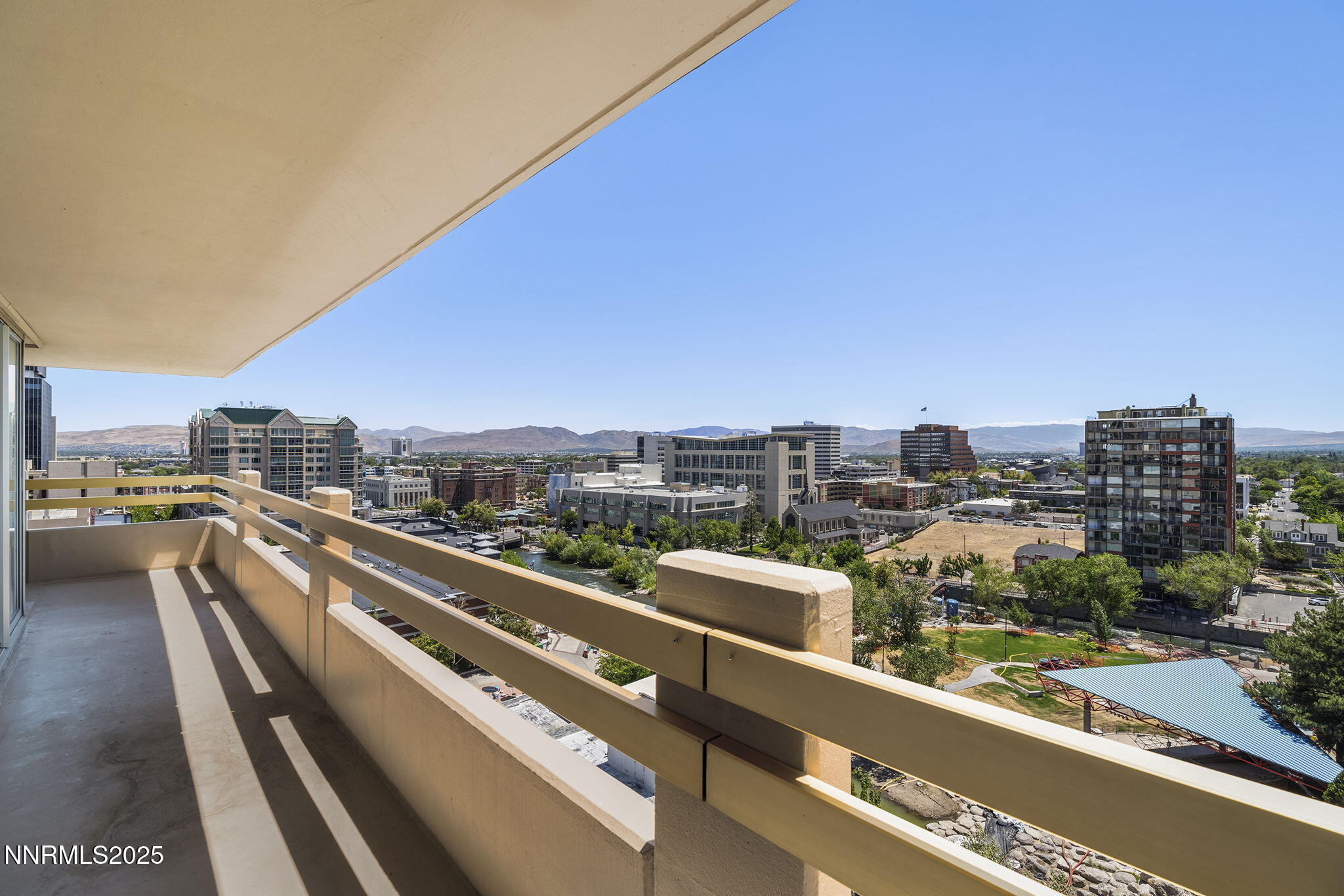 100 North Arlington Avenue, Unit 10E Reno, NV 89501 - Photo 19 of 47 a view of a city skyline from a balcony