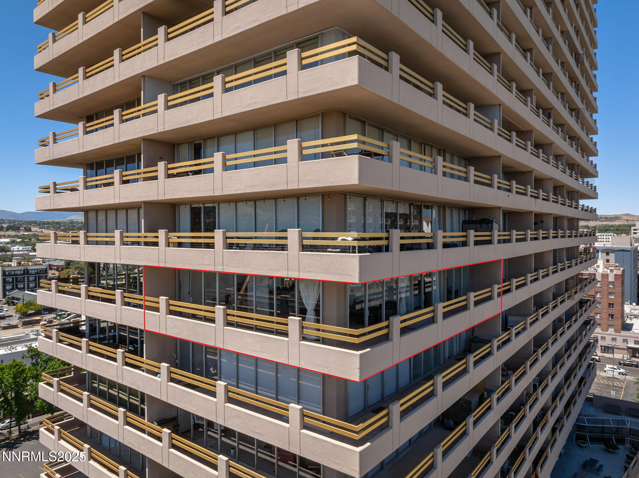 100 North Arlington Avenue, Unit 10E Reno, NV 89501 - Photo 24 of 47 a large building with a lot of windows