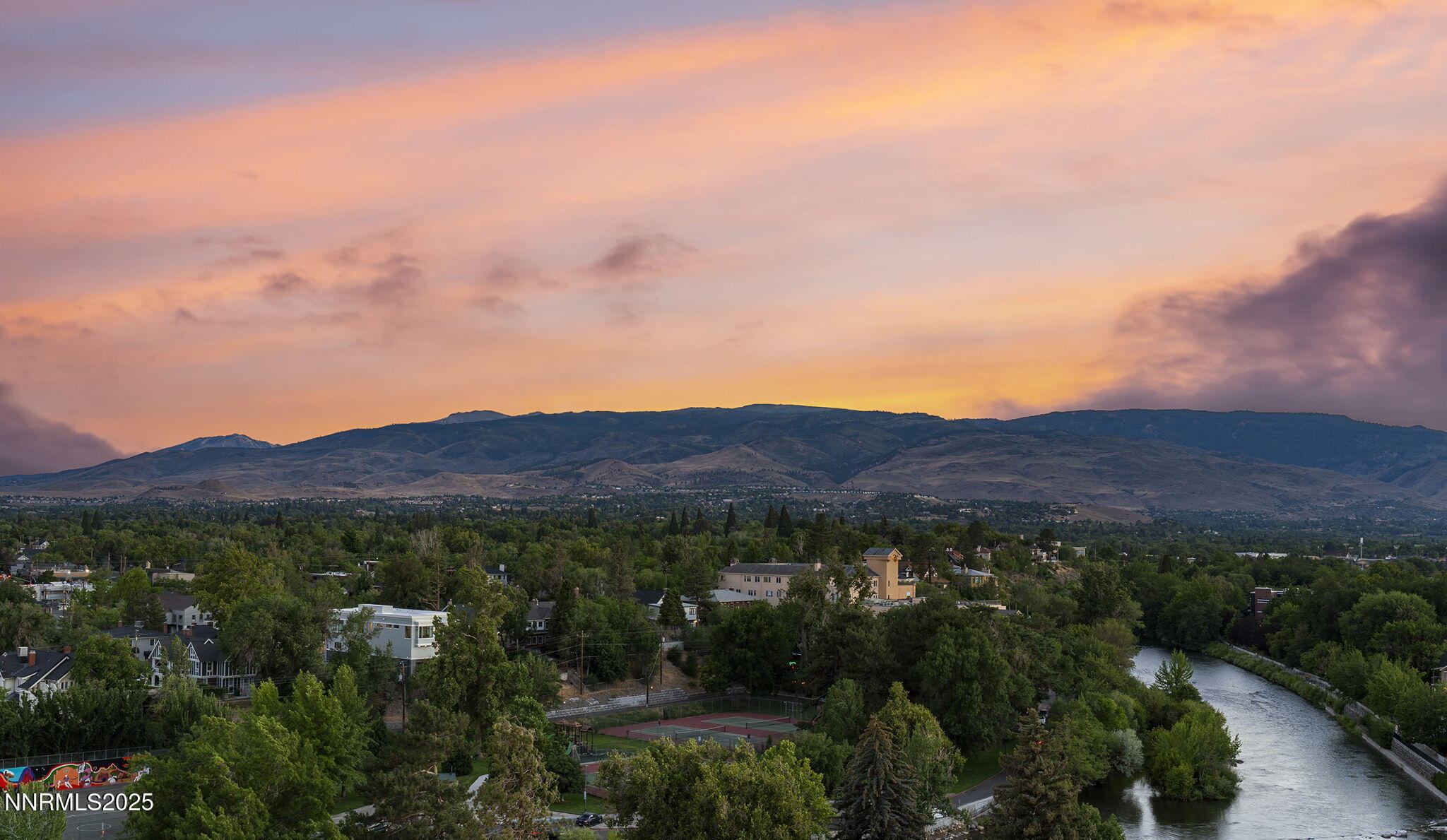 100 North Arlington Avenue, Unit 10E Reno, NV 89501 - Photo 33 of 47 an aerial view of residential house and green field