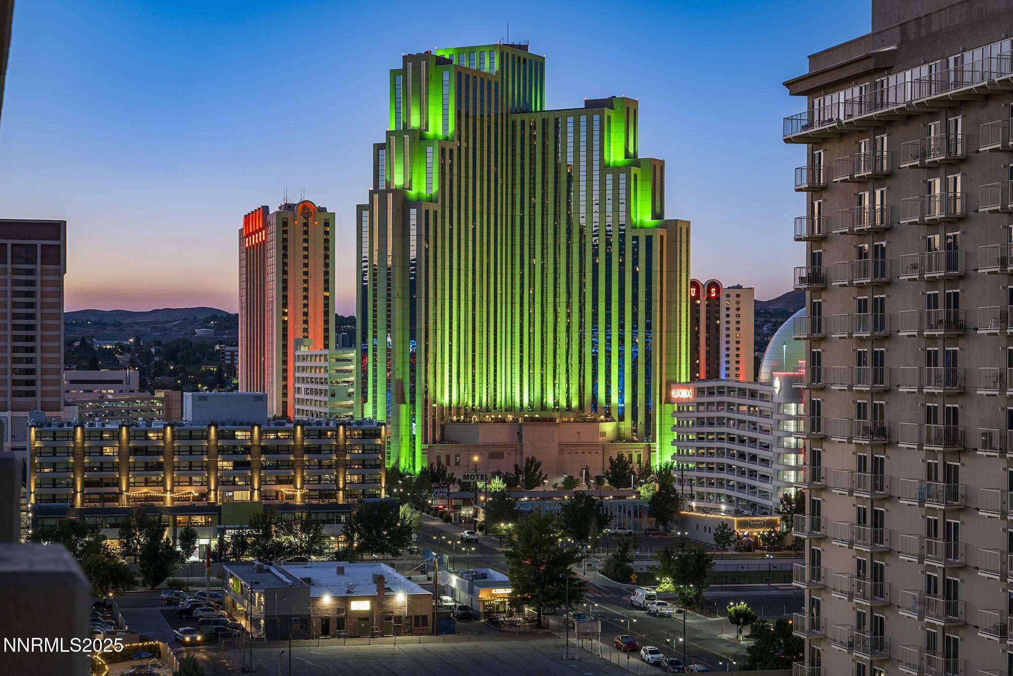 100 North Arlington Avenue, Unit 10E Reno, NV 89501 - Photo 34 of 47 a green building with outdoor space