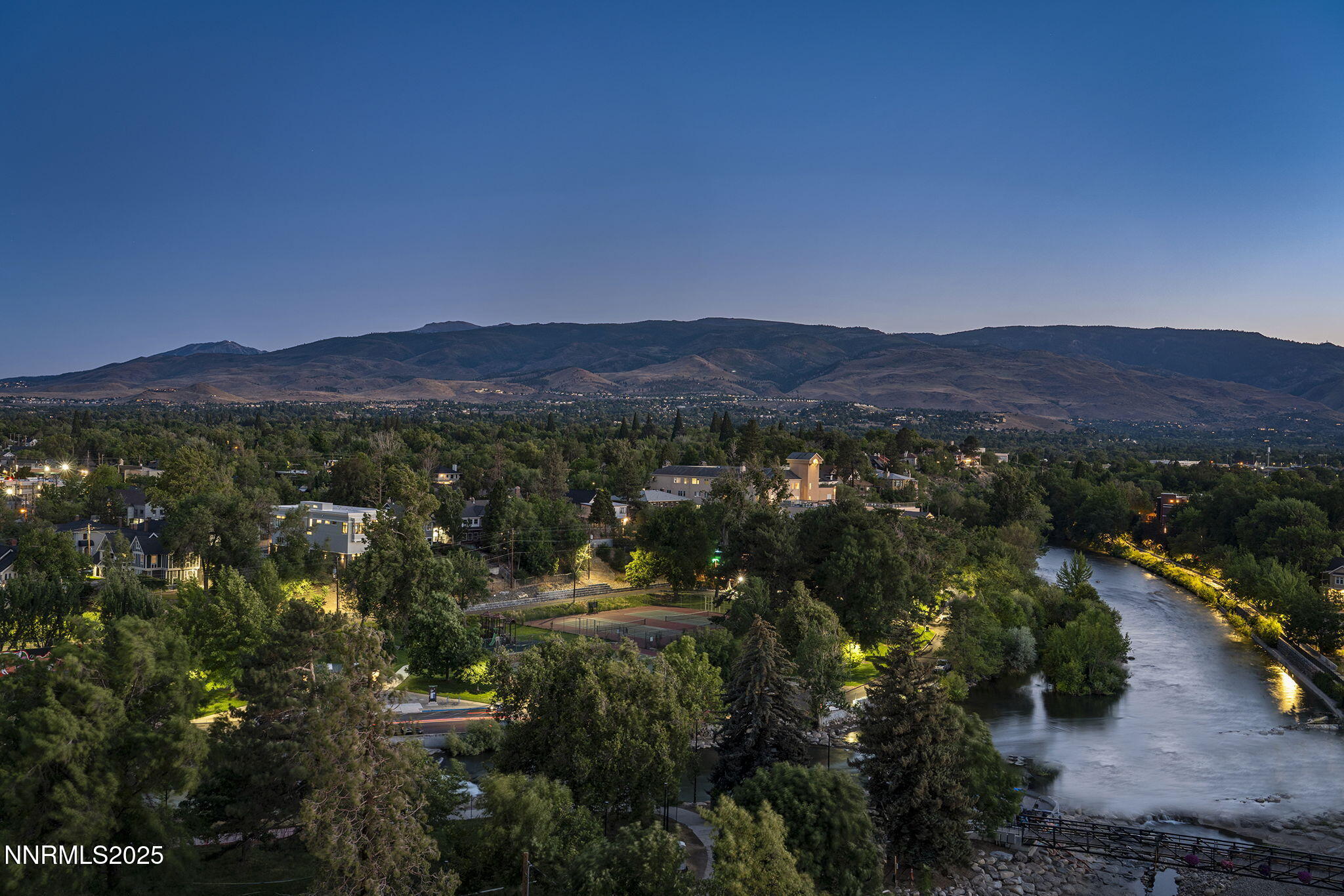 100 North Arlington Avenue, Unit 10E Reno, NV 89501 - Photo 35 of 47 a view of a town with mountains in the background