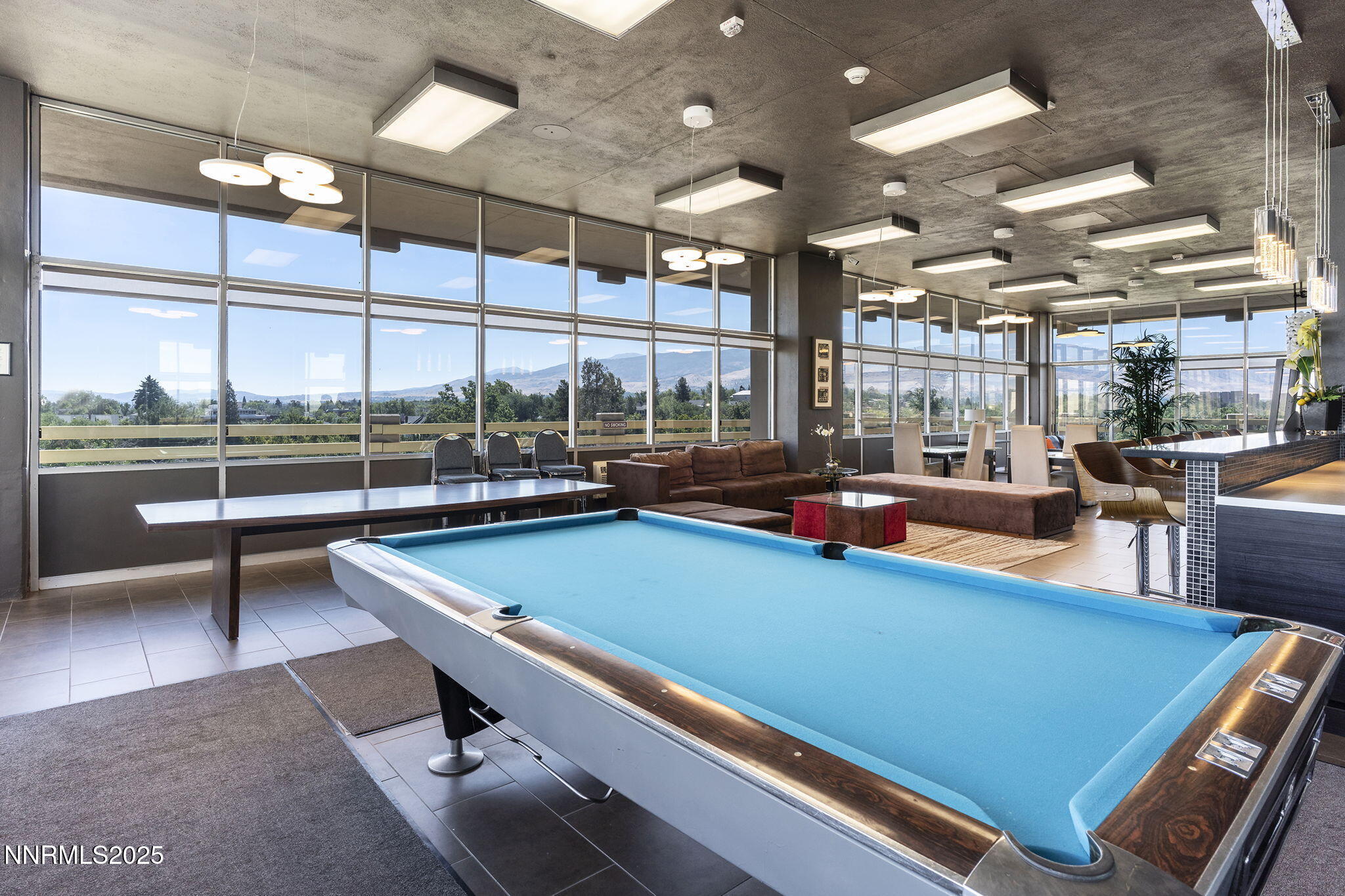 100 North Arlington Avenue, Unit 10E Reno, NV 89501 - Photo 42 of 47 a room with lots of tables and chairs