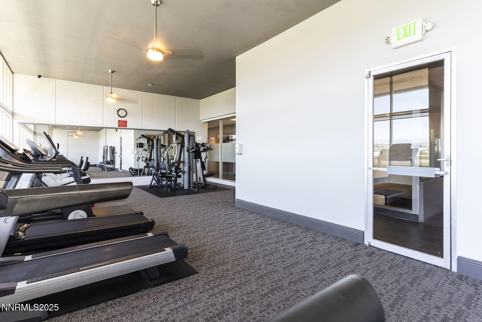 100 North Arlington Avenue, Unit 10E Reno, NV 89501 - Photo 44 of 47 a view of kitchen with stainless steel appliances kitchen island a stove and a refrigerator
