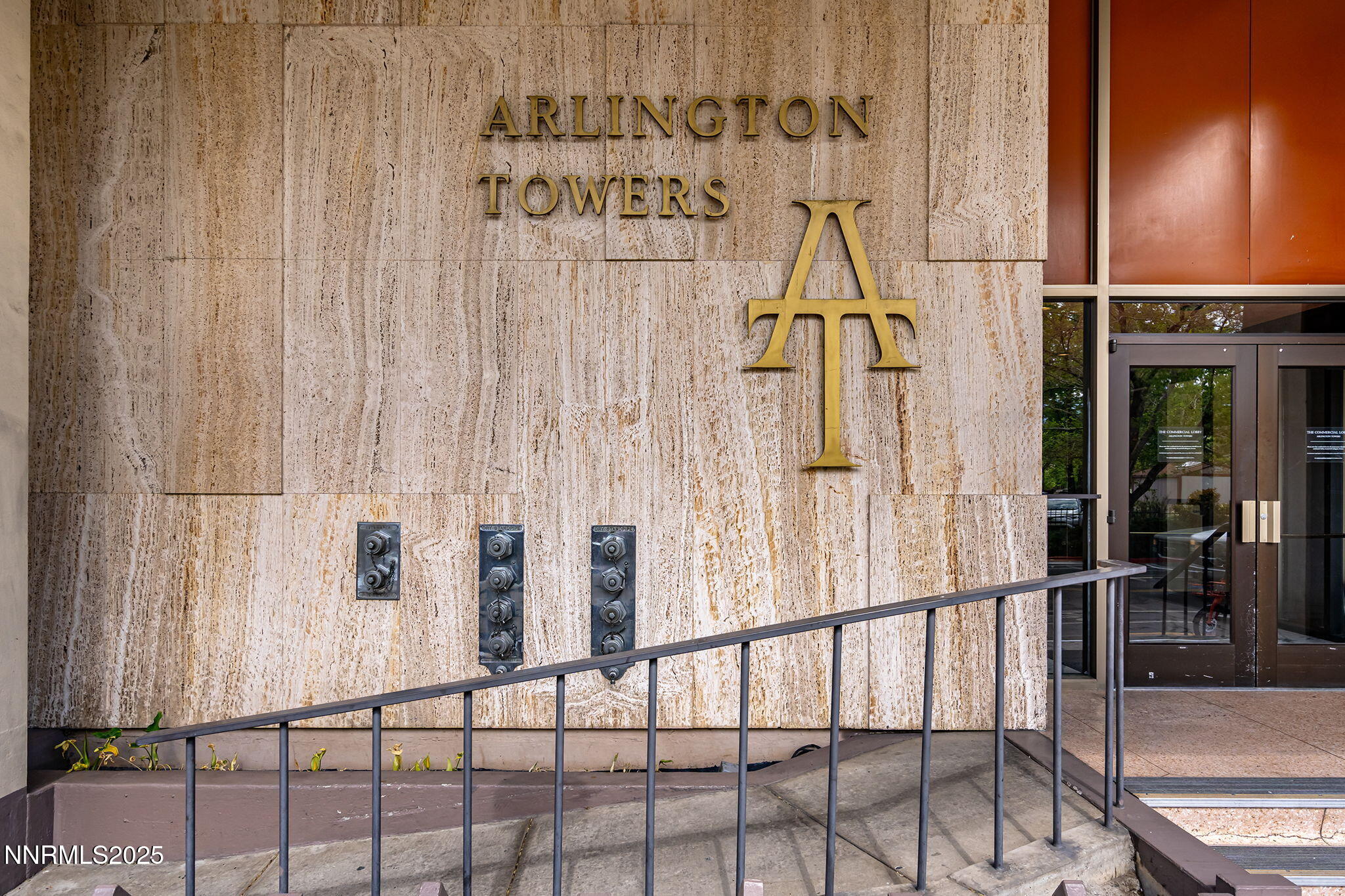 100 North Arlington Avenue, Unit 10E Reno, NV 89501 - Photo 47 of 47 a view of staircase with railing and a chandelier