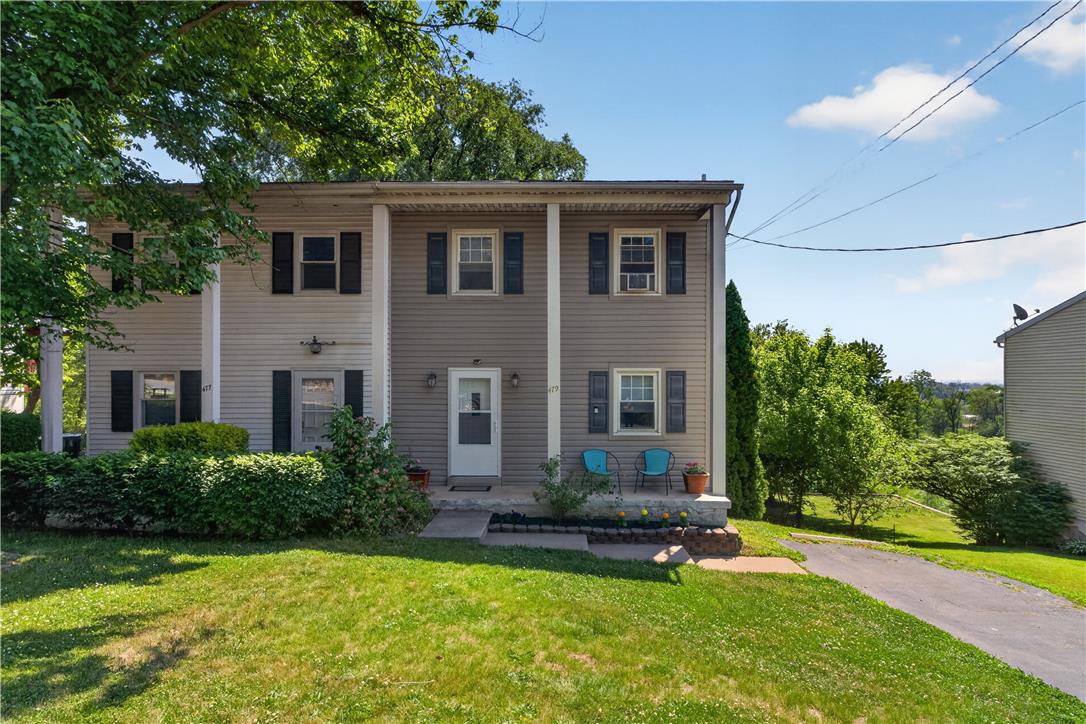 479 South 9th Street Akron, PA 17501 - Photo 1 of 33 A classic facade with charming window shutters, a neat lawn, and inviting porch area define this residence.