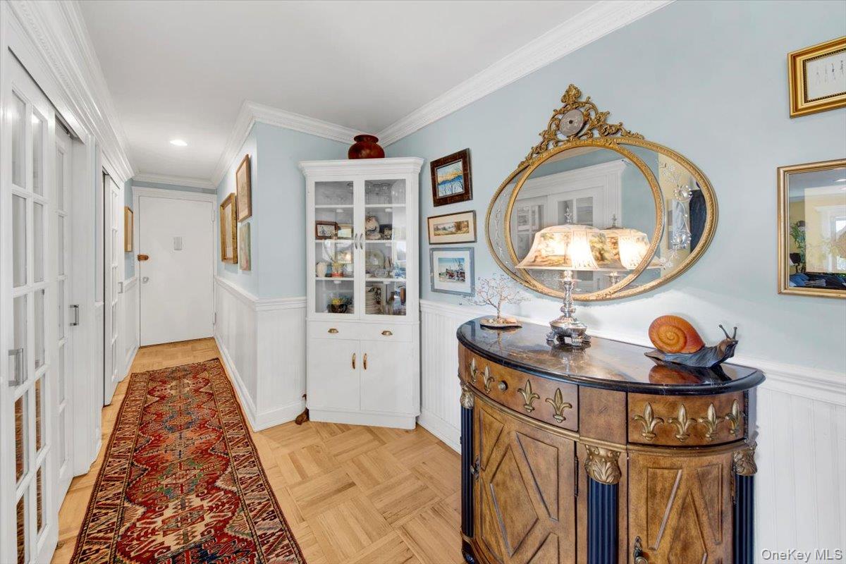 266 Pelham Road, Unit 5H New Rochelle, NY 10805 - Photo 2 of 27 a view of a livingroom with furniture and mirror