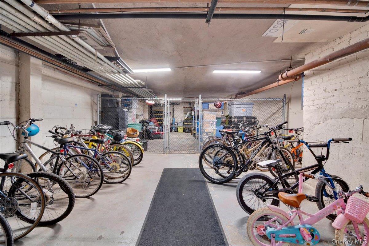 266 Pelham Road, Unit 5H New Rochelle, NY 10805 - Photo 21 of 27 a view of a bike garage with bicycles