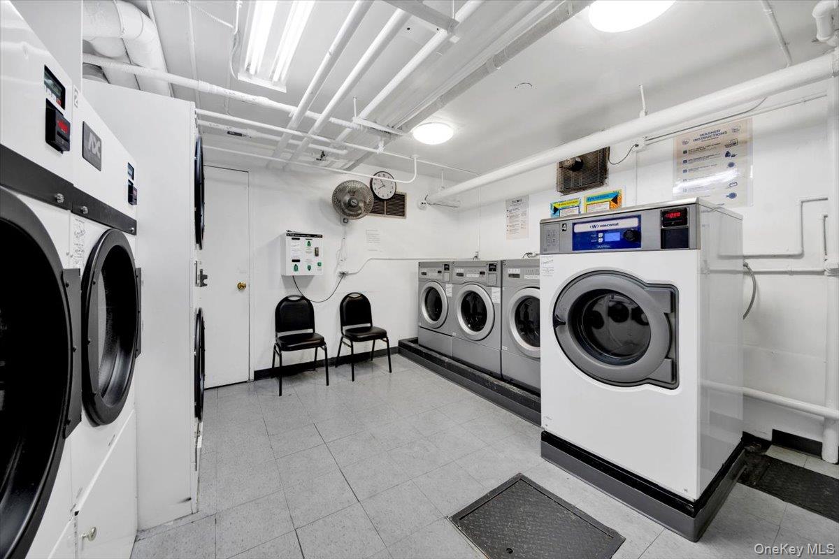 266 Pelham Road, Unit 5H New Rochelle, NY 10805 - Photo 22 of 27 a utility room with dryer and washer