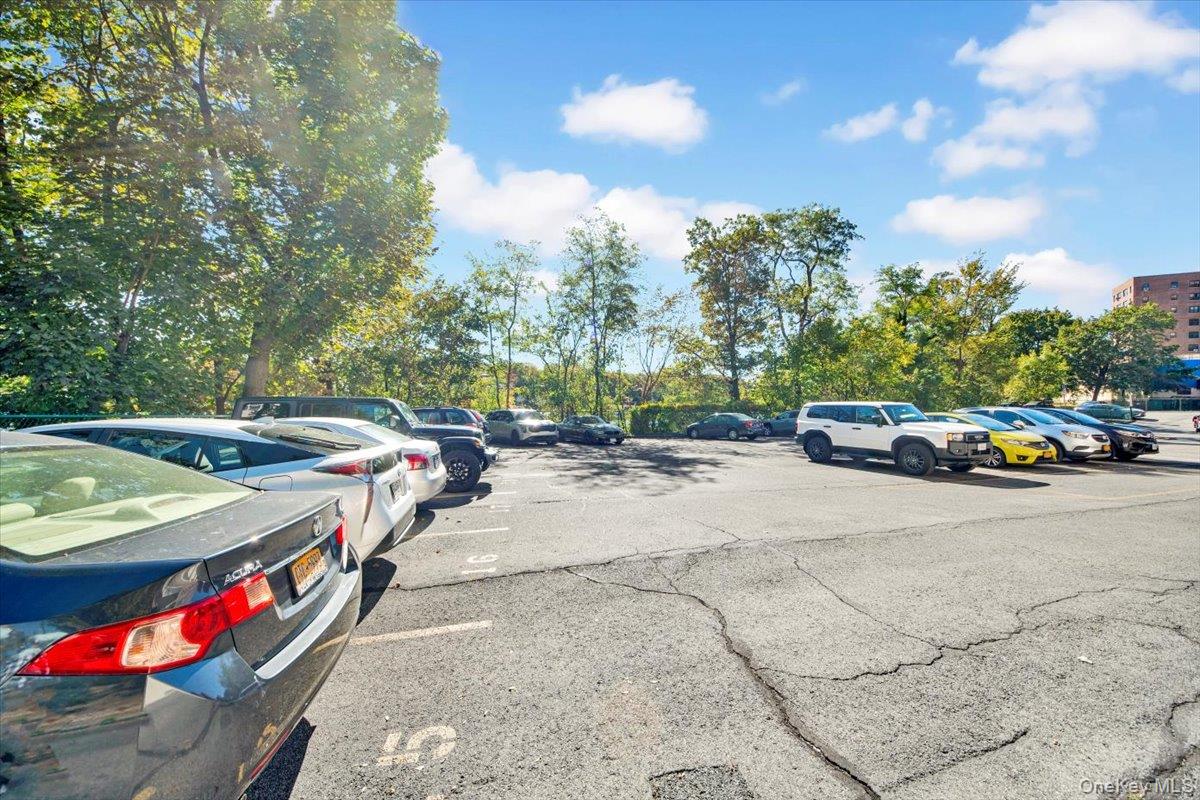 266 Pelham Road, Unit 5H New Rochelle, NY 10805 - Photo 24 of 27 a view of street with parked cars