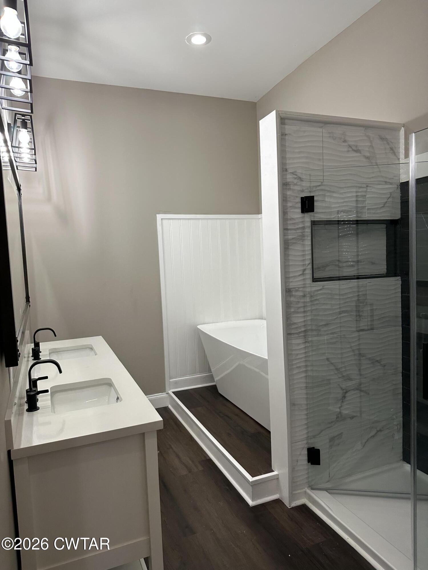 237 Talbot Street Jackson, TN 38301 - Photo 12 of 38 a bathroom with a sink a toilet and shower