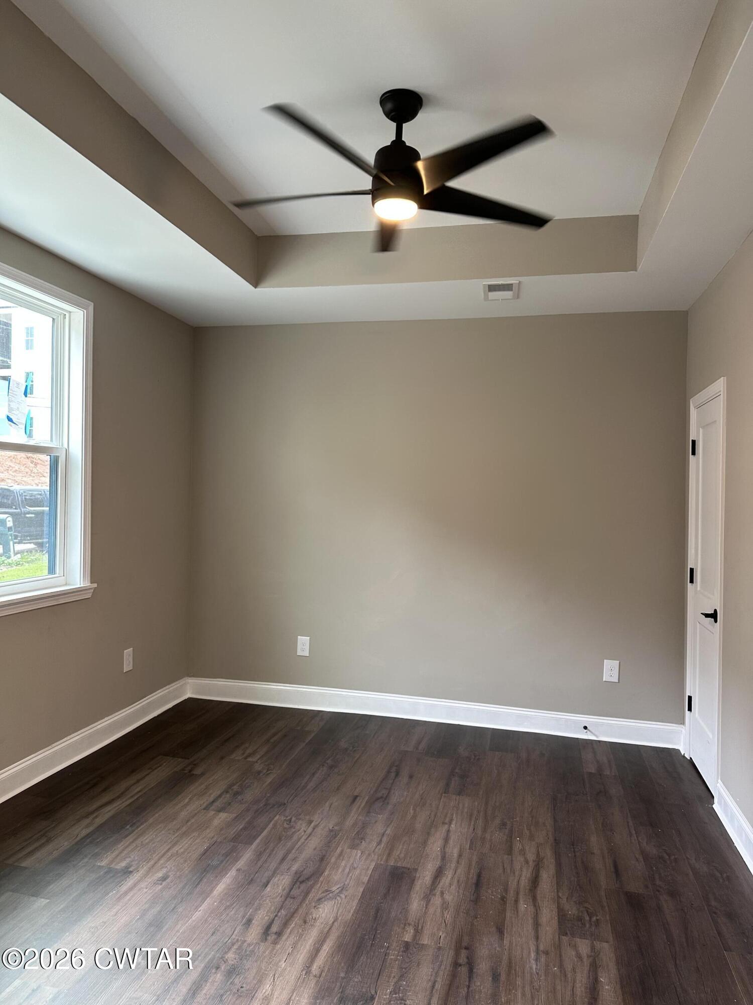 237 Talbot Street Jackson, TN 38301 - Photo 20 of 38 wooden floor in an empty room