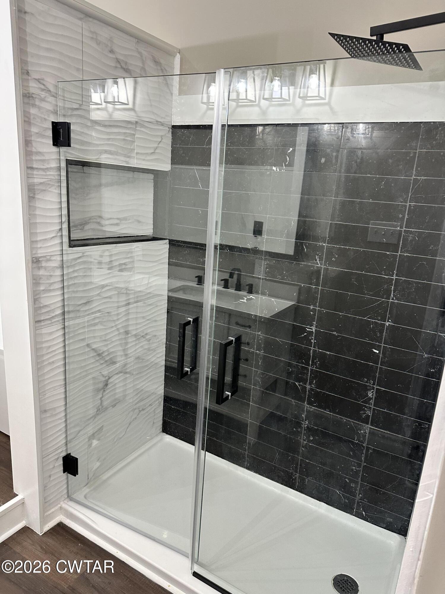 237 Talbot Street Jackson, TN 38301 - Photo 22 of 38 a bathroom with a shower and a sink