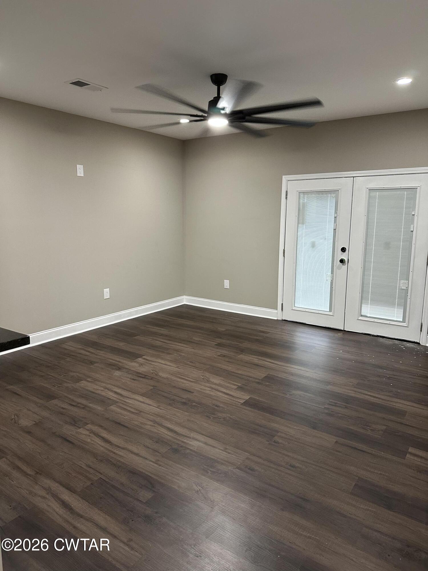237 Talbot Street Jackson, TN 38301 - Photo 9 of 38 a view of a room with wooden floor