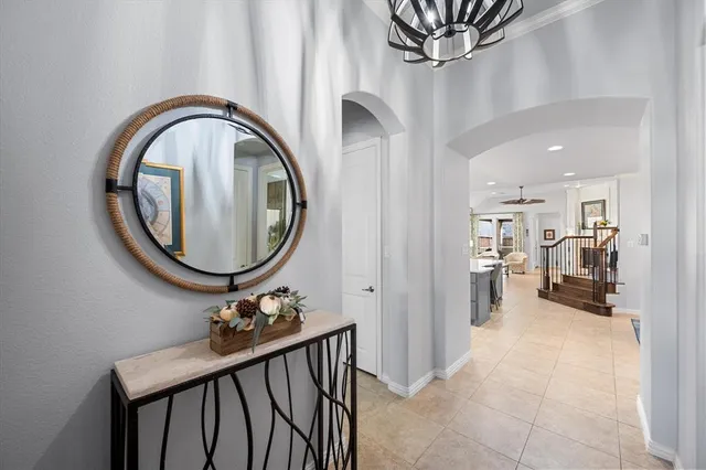 a view of a hallway with a livingroom and a furniture