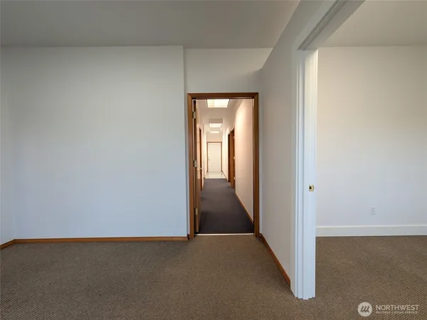 a view of hallway with stairs