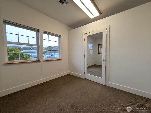 an empty room with a window