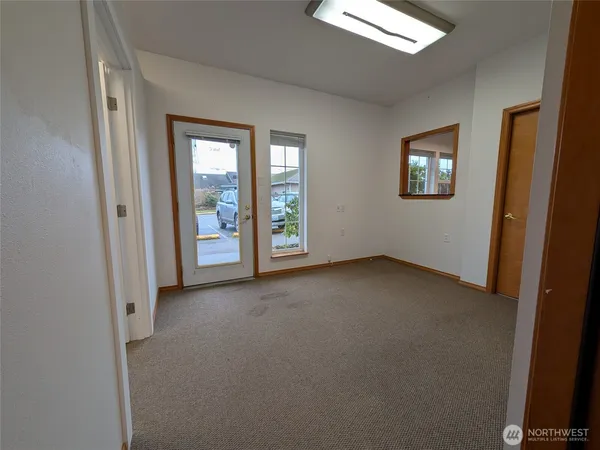 an empty room with windows
